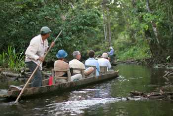 Naturetrek guests exploring by boat (Peter English)