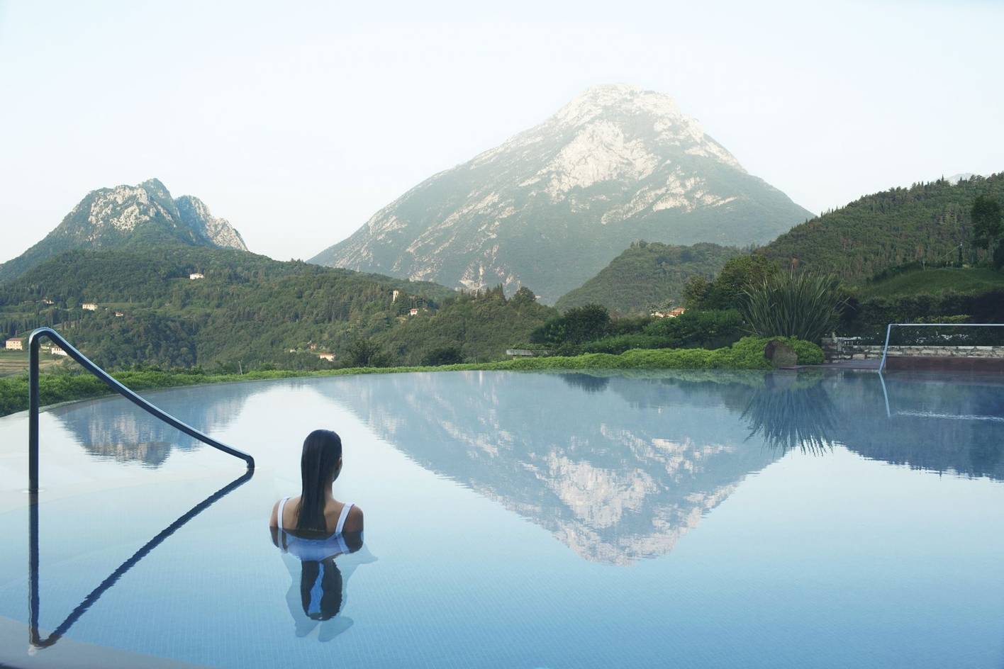 Woman in the outdoor pool at Lefay Resort and Spa in Lake Garda