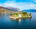 Isola Bella and Stresa town aerial panoramic view. Isola Bella is one of the Borromean Islands of Lago Maggiore in north Ita…