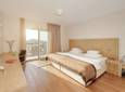HotelResidence_DIOKLECIJAN_room-bedRoom-interier-panorama_2048px_5D3A2360-695x409.jpg