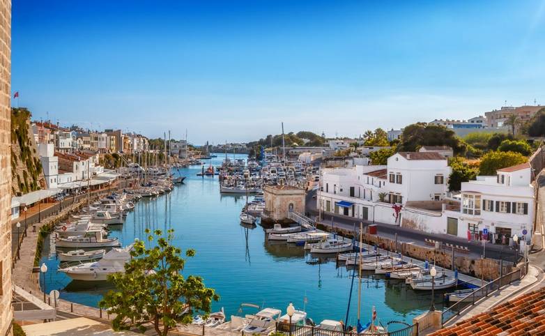 View on old town Ciutadella port on sunny day, Menorca island, Spain.
