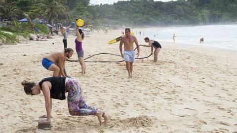 Group of people working out on the beach at Phuket Cleanse in Thailand