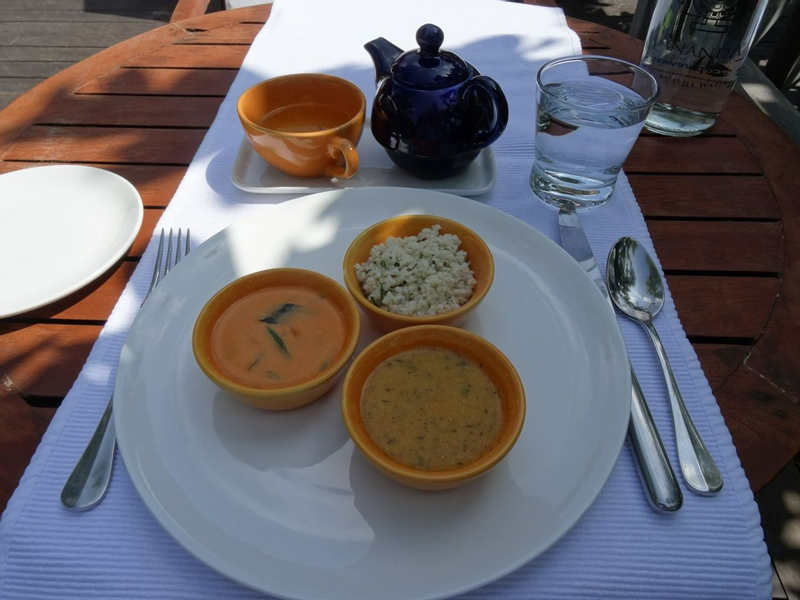 Trio of dishes on a plate at a table at Ananda in the Himalayas