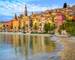 Sand beach beneath the colorful old town Menton on french Riviera, France