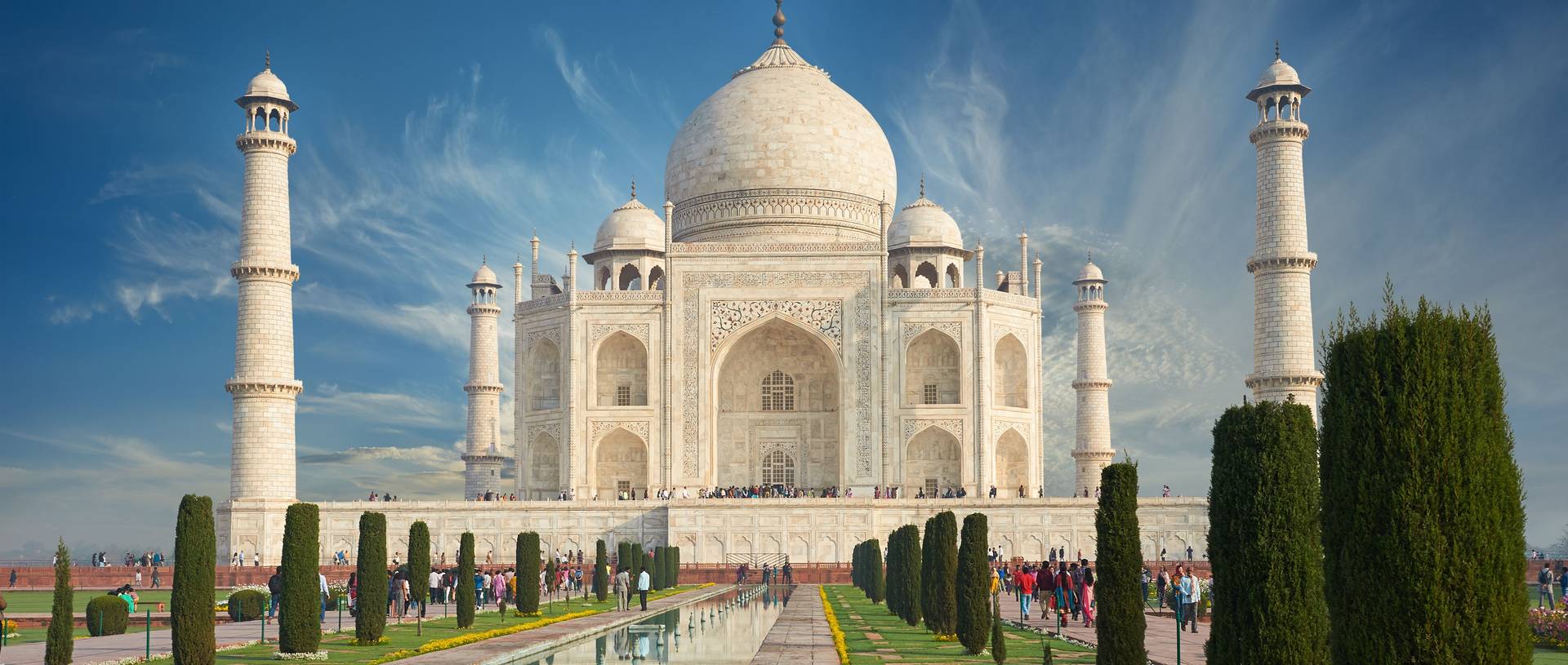 The Taj Mahal is an ivory-white marble mausoleum on the south bank of the Yamuna river in the Indian city of Agra, Uttar Pra…