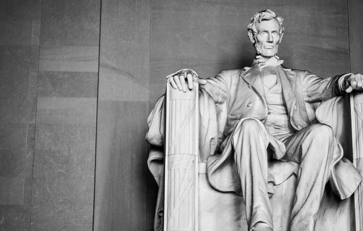 Imposing president Lincoln looking over the district. Black and white photo with perspective Imposing president Lincoln looking over the district. Black and white photo with perspective