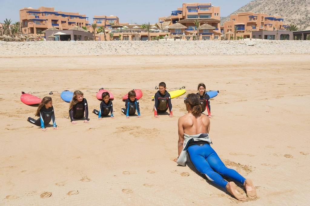 Children's surfing lesson at Paradis Plage, Morocco