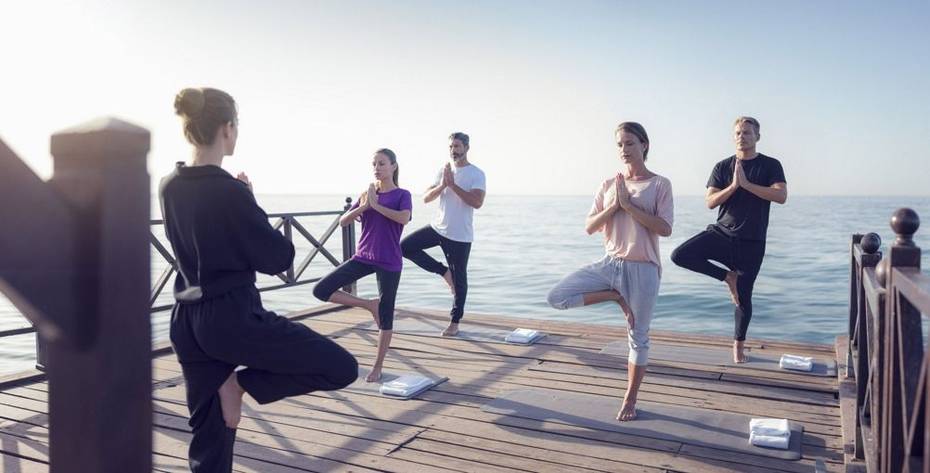 Group yoga class at Marbella Club