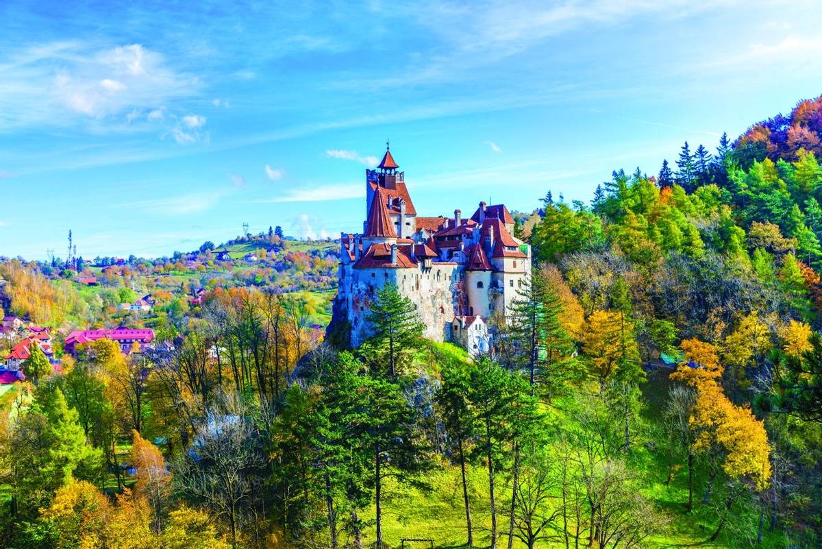 Panoramic view over Dracula medieval Castle Bran in autumn season, the most visited tourist attraction of  Brasov, Transylva…