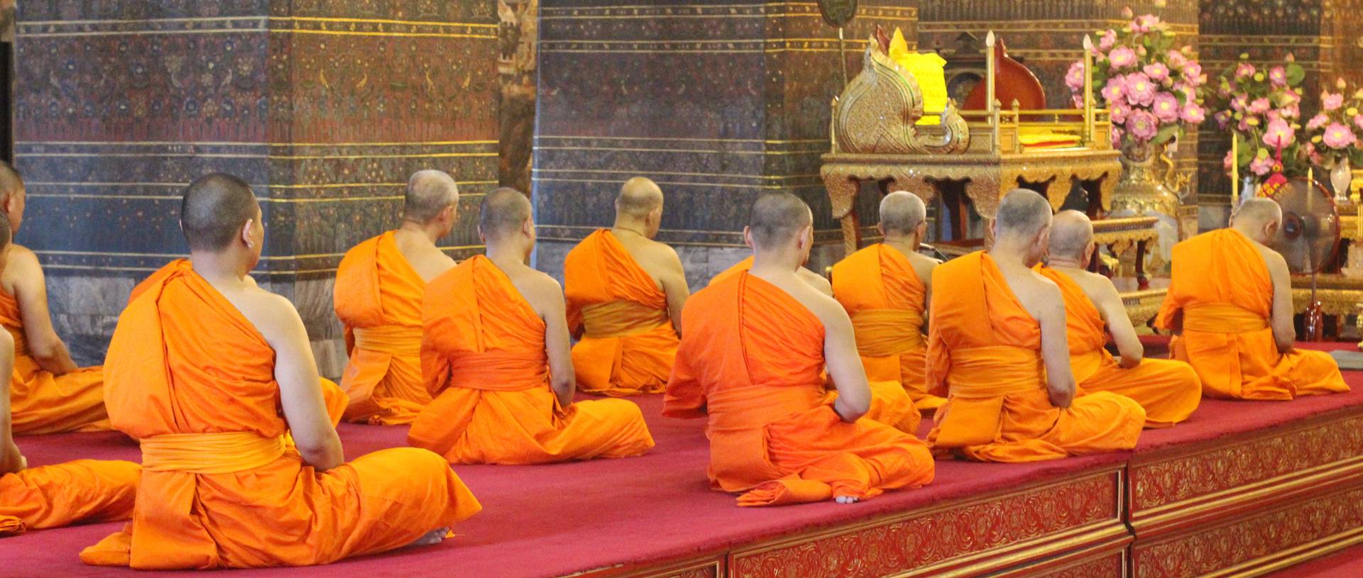 Worshippers Praying Inside The Temples Of Bangkok