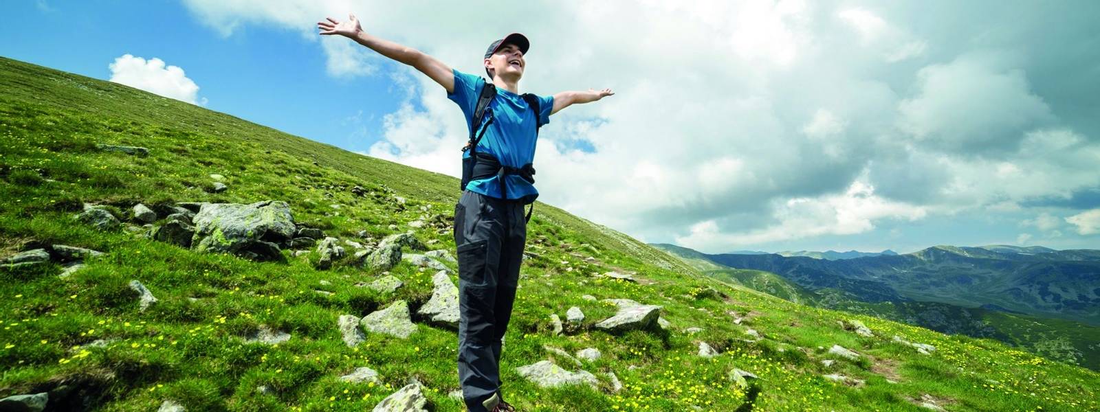 Teenage boy hiker on the mountains