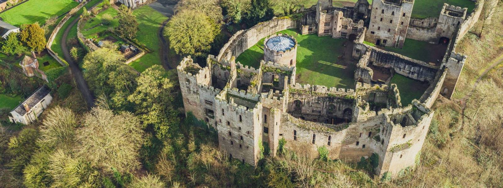 Top down aerial view over ruins of medieval fortification - Ludlow Castle in Shropshire, UK