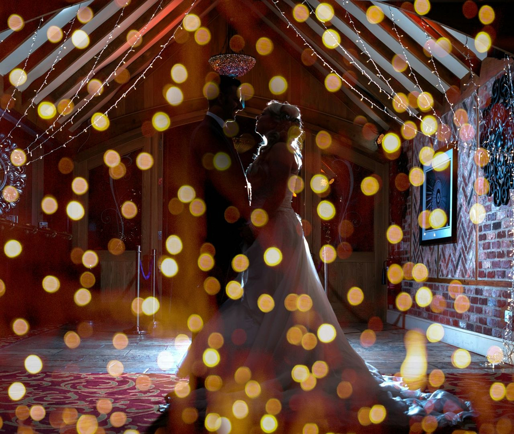 Couple surrounded fairy lights for a Winter Wedding 