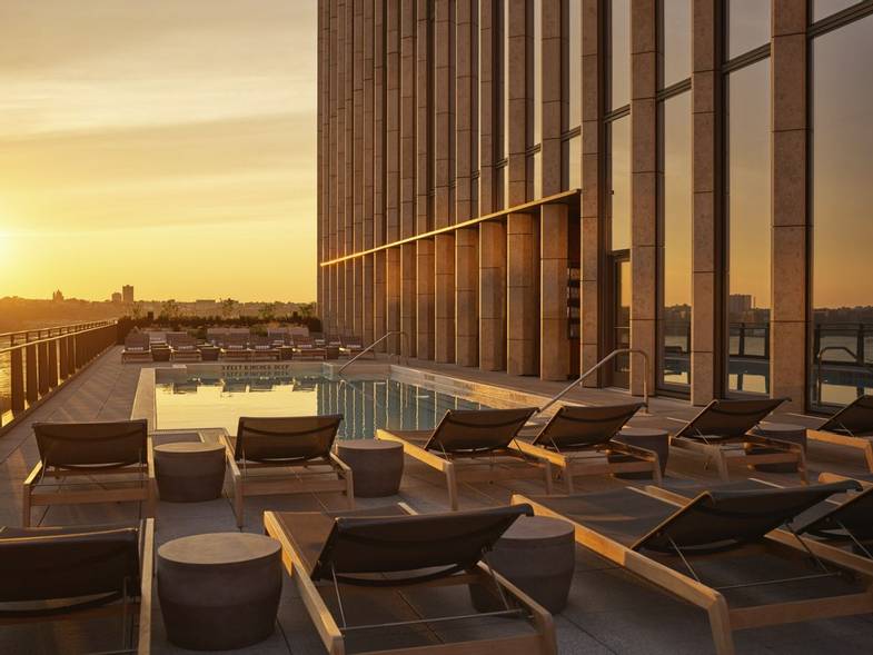 equinox-hotels-outdoor-pool-deck-sunset-3.jpg