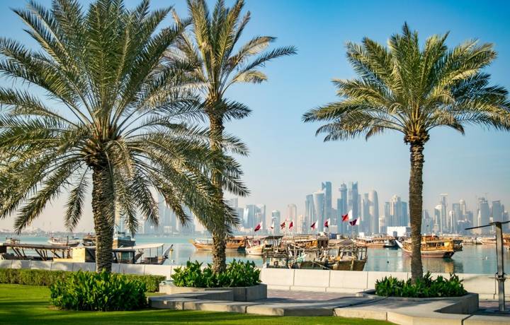 Wide Shot of Corniche, Doha Harbor, and Skyline of Doha's Financial District (West Bay) - Doha, Qatar Wide Shot of Corniche, Doha Harbor, and Skyline of Doha's Financial District (West Bay) - Doha, Qatar