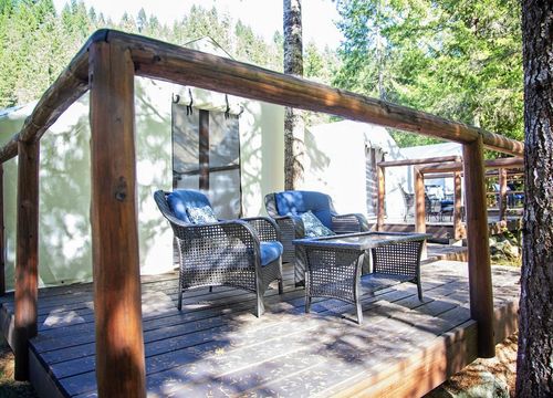 REO-rafting-glamping-yoga-resort-tent-Rose-Garden-deck-pine-needles.jpg