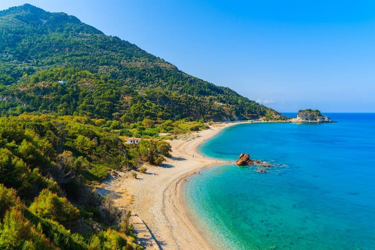 A view of Potami beach with azure sea water, Samos island, Greece