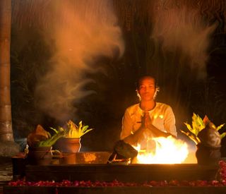 A never-ending fire is maintained at the Agni Hotri pavillion, where Balinese priests offer prayers to purify the Earth.