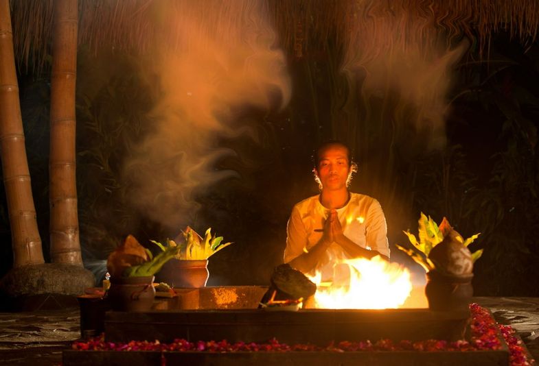 A never-ending fire is maintained at the Agni Hotri pavillion, where Balinese priests offer prayers to purify the Earth.