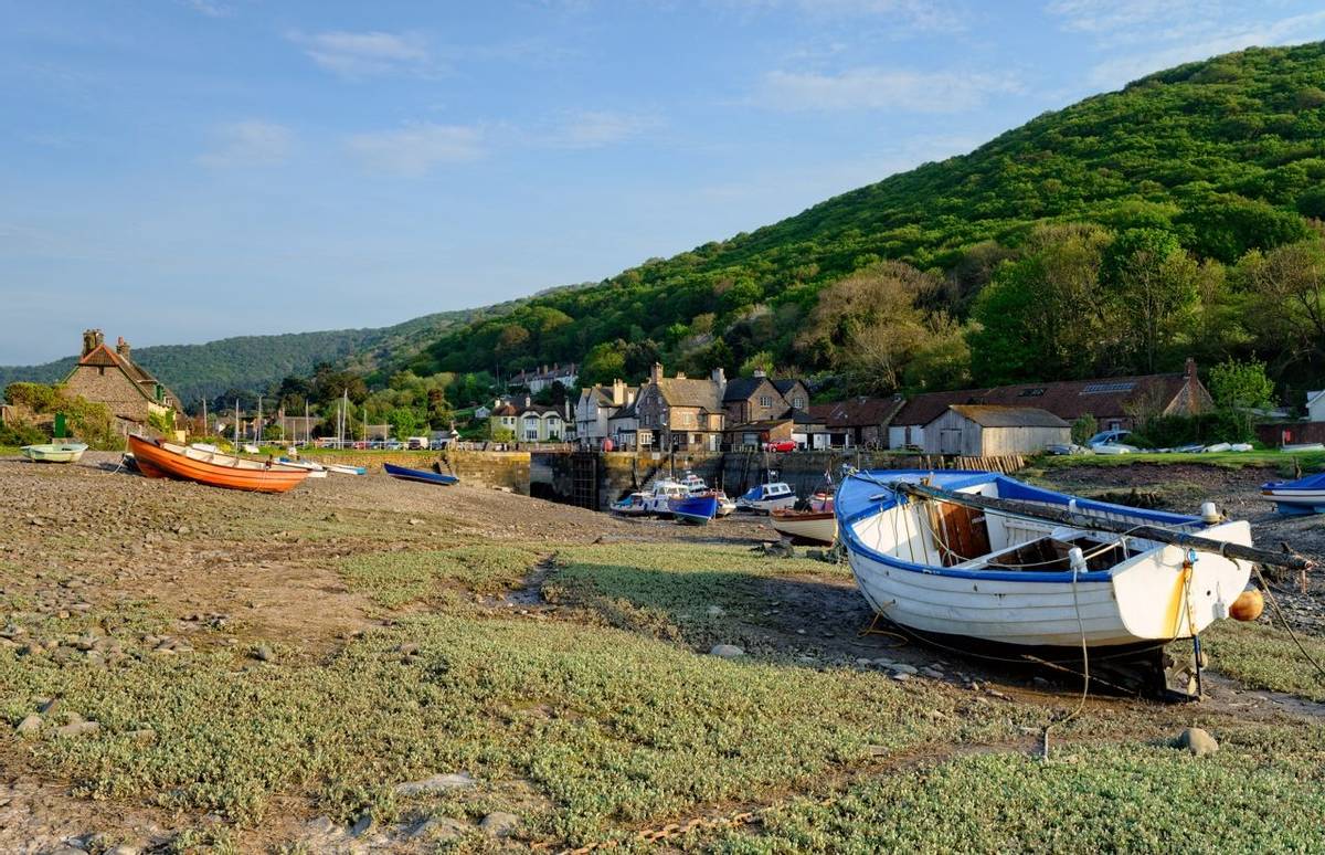 Boats on the shore at Porlock Weir, a pretty fishing villlage on the Exmoor coast in Somerset