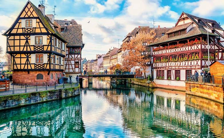 Traditional half-timbered houses on the canals district La Petite France in Strasbourg, UNESCO World Heritage Site, Alsace, …