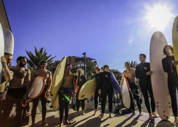 Learn to surf or stand up paddleboard on holiday
