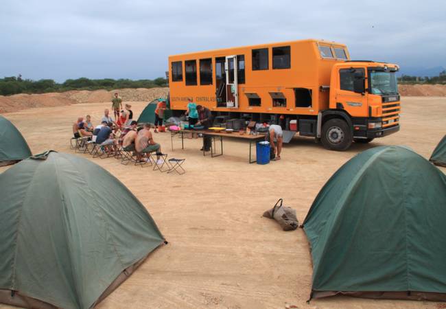 South American overland truck camping on beach