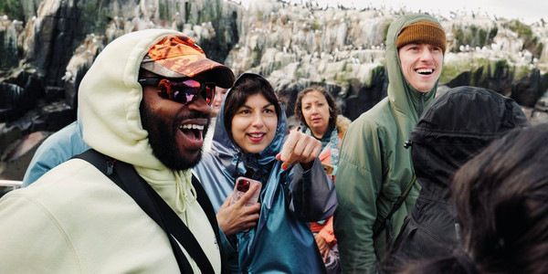 Woman in a red dress leading a salsa dance class