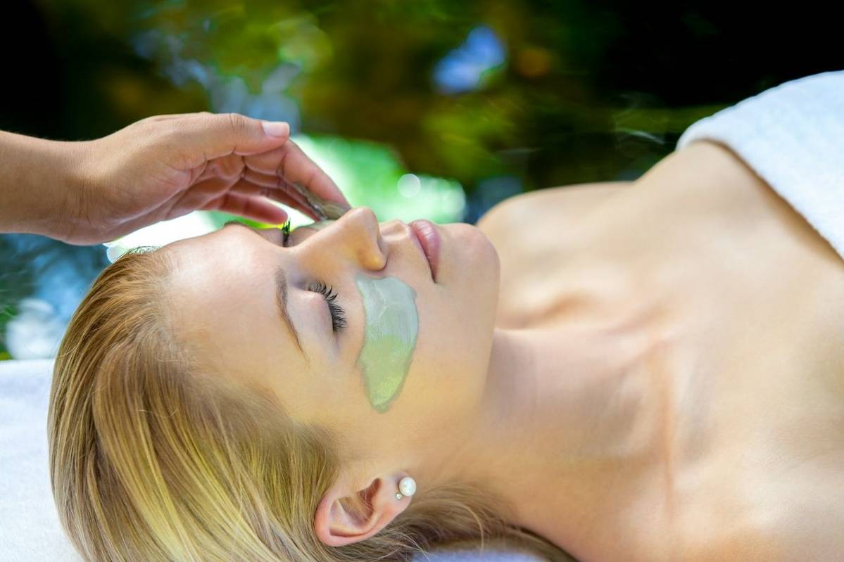 Woman having a face mask applied to her face at Shanti Maurice in Mauritius 