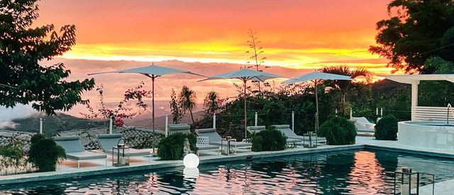 The Retreat Costa Rica pool BigPoolSunset.jpg