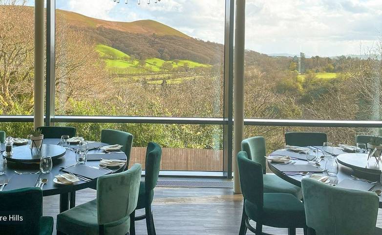 Stunning views from the refurbished dining room at Longmynd House, Church Stretton, Shropshire Hills