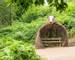 A badger shelter and seat on the Forest to Forest trail in the Forest of Dean at Beechenhurst Lodge near Coleford, Glouceste…