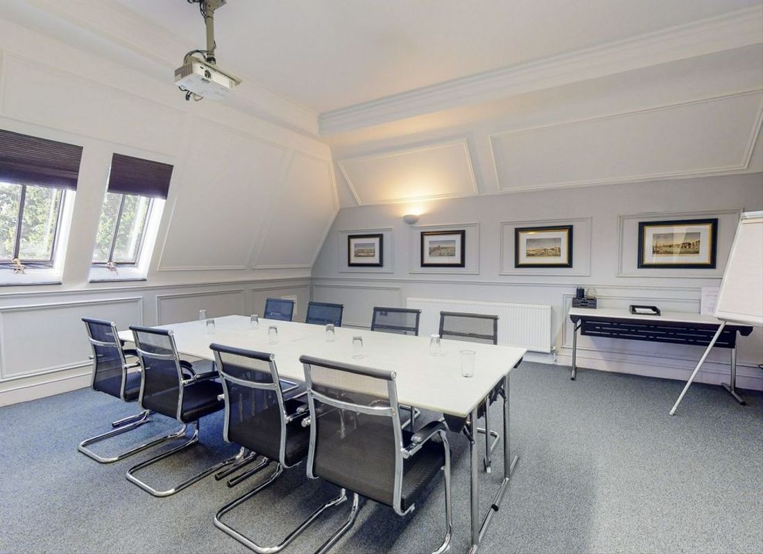 Large and spacious meeting with windows and art on the walls