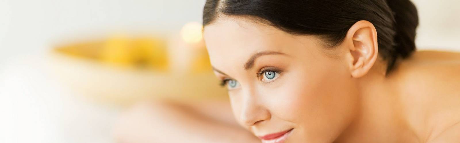 20206522 - picture of woman in spa salon lying on the massage desk