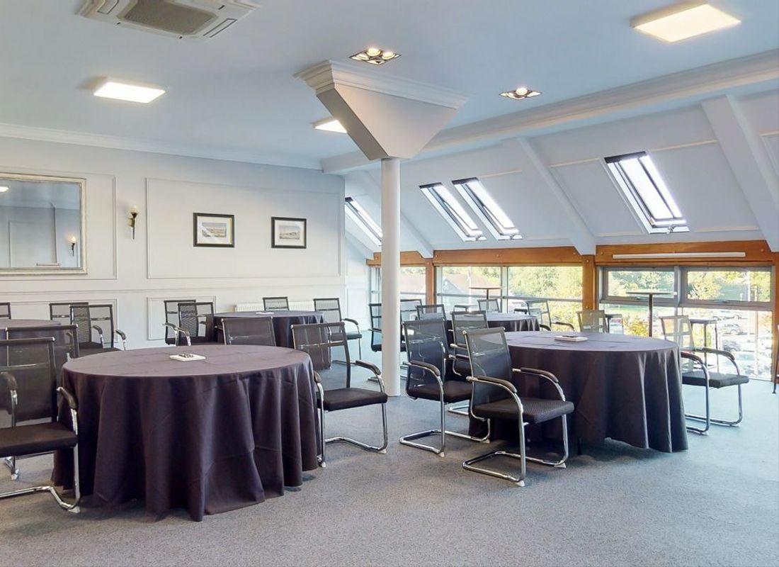 Large and spacious meeting room with ballroom chair and table setup