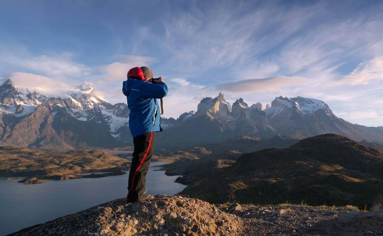 Photographer in a national park Torres del Paine, Patagonia, Chile