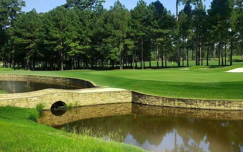 The Haywood El Dorado Mystic Creek Golf Club bridge over water.jpg