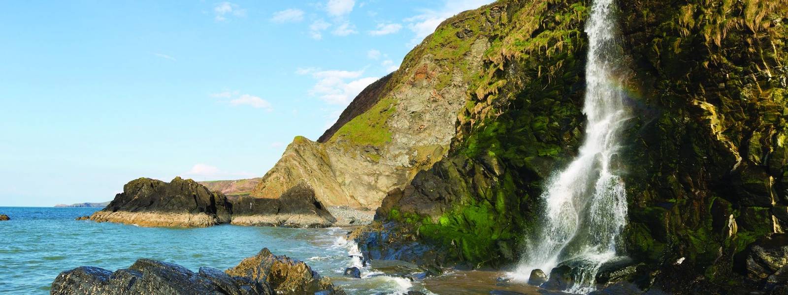 Waterfall at Tresaith Beach, Cardigan Bay, Wales.