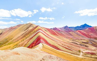 Panoramic view of Rainbow Mountain at Vinicunca mount in Peru - Travel and wanderlust concept exploring world nature wonders…