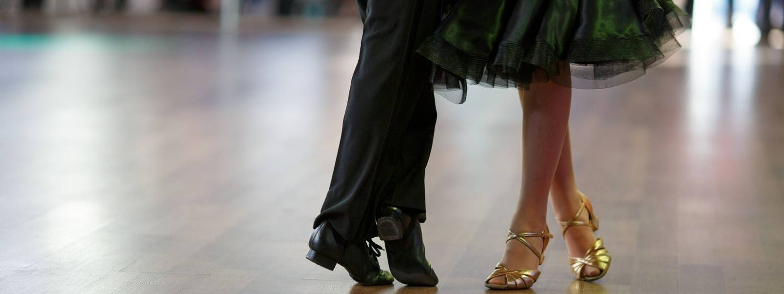 Closeup of dancer's legs as they do the ballroom dance