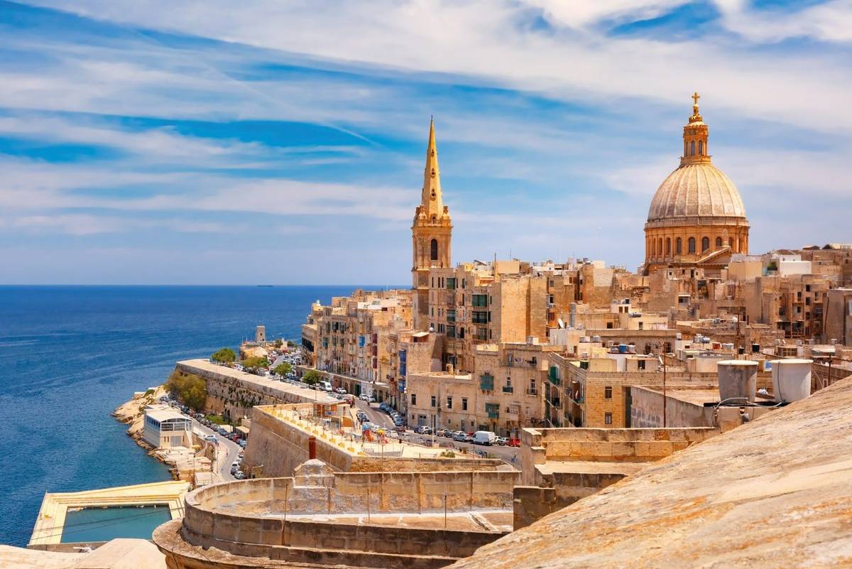 View from above of roofs and church of Our Lady of Mount Carmel and St. Paul's Anglican Pro-Cathedral, Valletta, Capital cit…