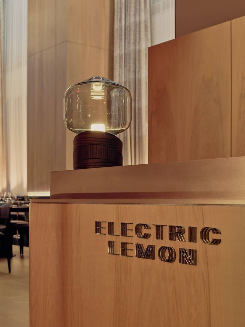 equinox-hotels-ElectricLemon-HostStand.jpg
