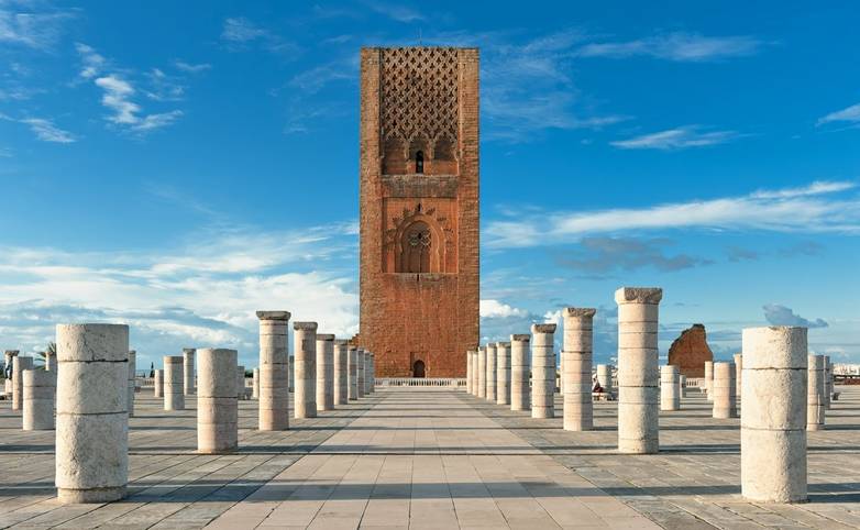 Tour Hassan tower in the square with stone columns. Made of red sandstone, important historical and tourist complex in Rabat…