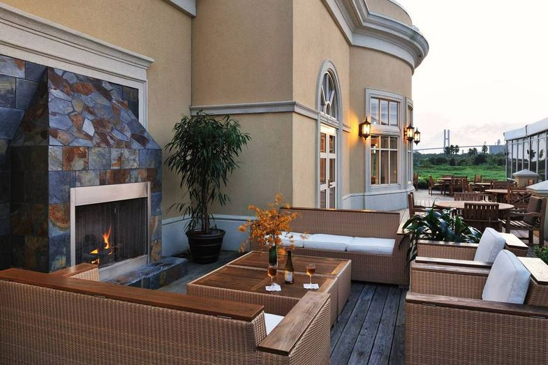 The Westin Savannah Harbor Golf Resort & Spa deck fireplace.jpg