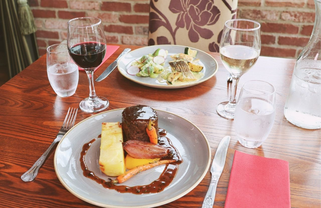 Dinner with a glass of wine in the Kings Restaurant