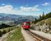SCHAFBERGBAHN Cog Railway running from St. Wolfgang up the Schafberg, Austria.Journey to the top of Alps through lush fields…
