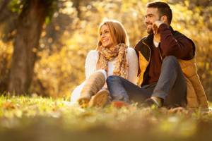 Beautiful couple in love in colorful park