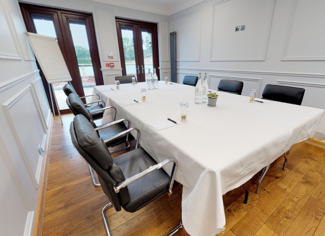 Small meeting room with wooden floors