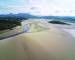 Aerial view, Drone panorama of Grifftan island on low tide sea in Snowdonia mountains in Wales
