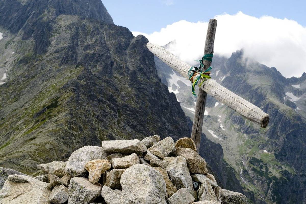 Wooden cross on top of the mountain Velka Svistovka in Tatra Mountains, Slovakia.